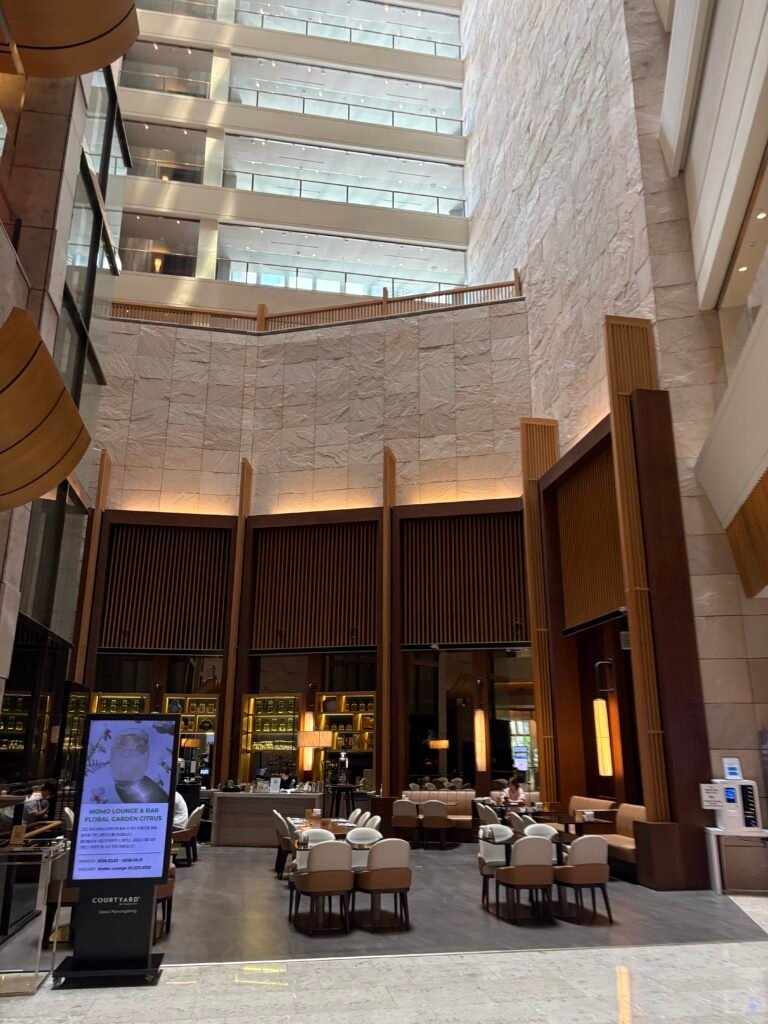 Second-floor lobby and tall central atrium at Courtyard by Marriott Seoul Myeongdong