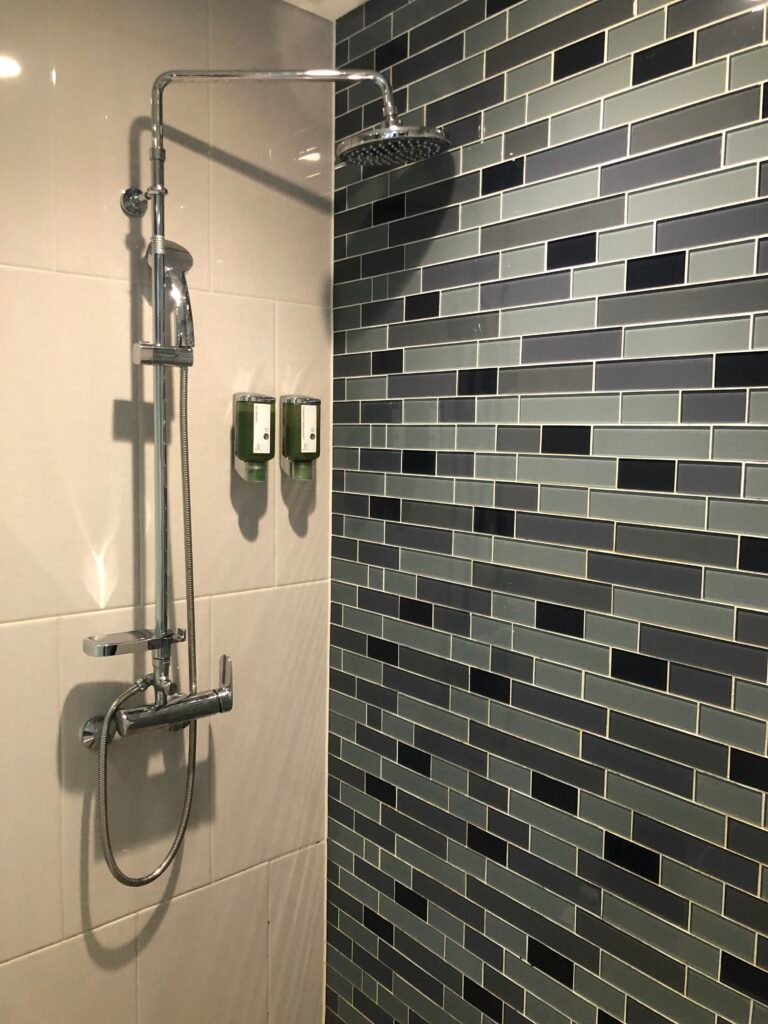 Walk-in shower with wall-mounted amenities at Fairfield by Marriott Seoul