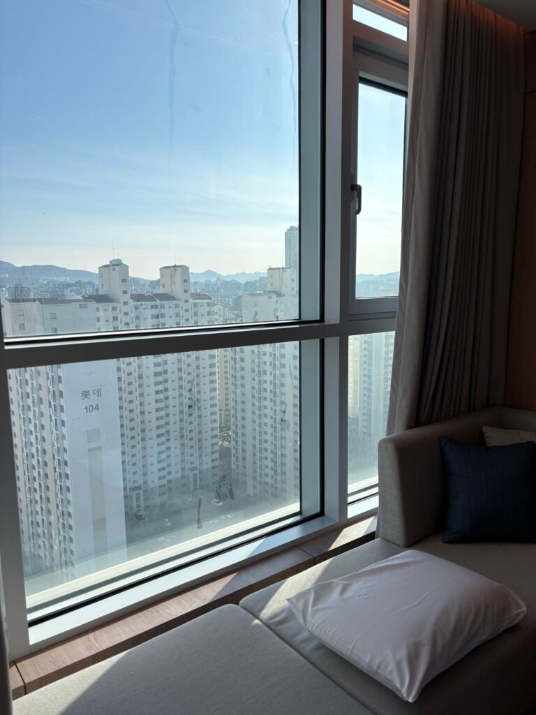 Window bench and east-facing view from a guest room at The Link Seoul