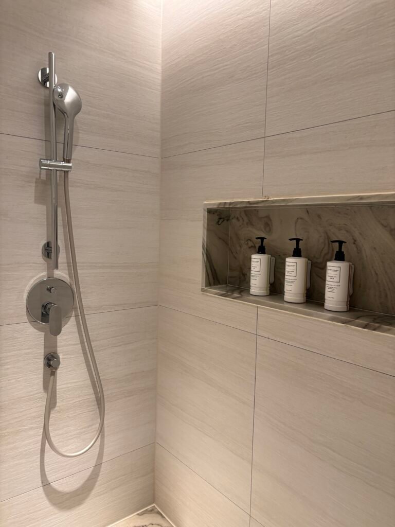 Walk-in shower with Gilchrist and Soames bath amenities at The Link Seoul