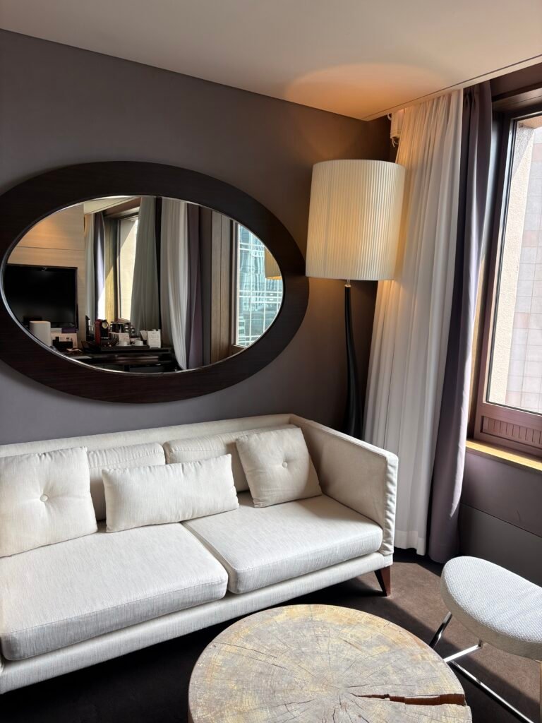 Sofa and table in the separate living room of THE PLAZA Seoul Premier Suite