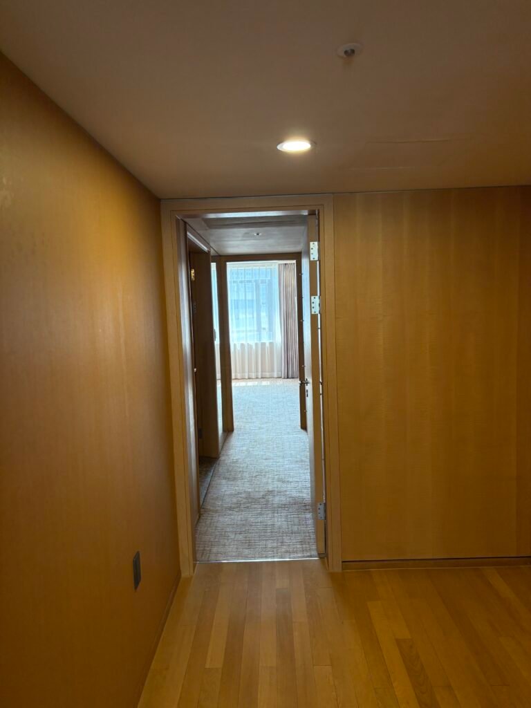 Private corridor connecting the living room and bedroom of the Executive Suite