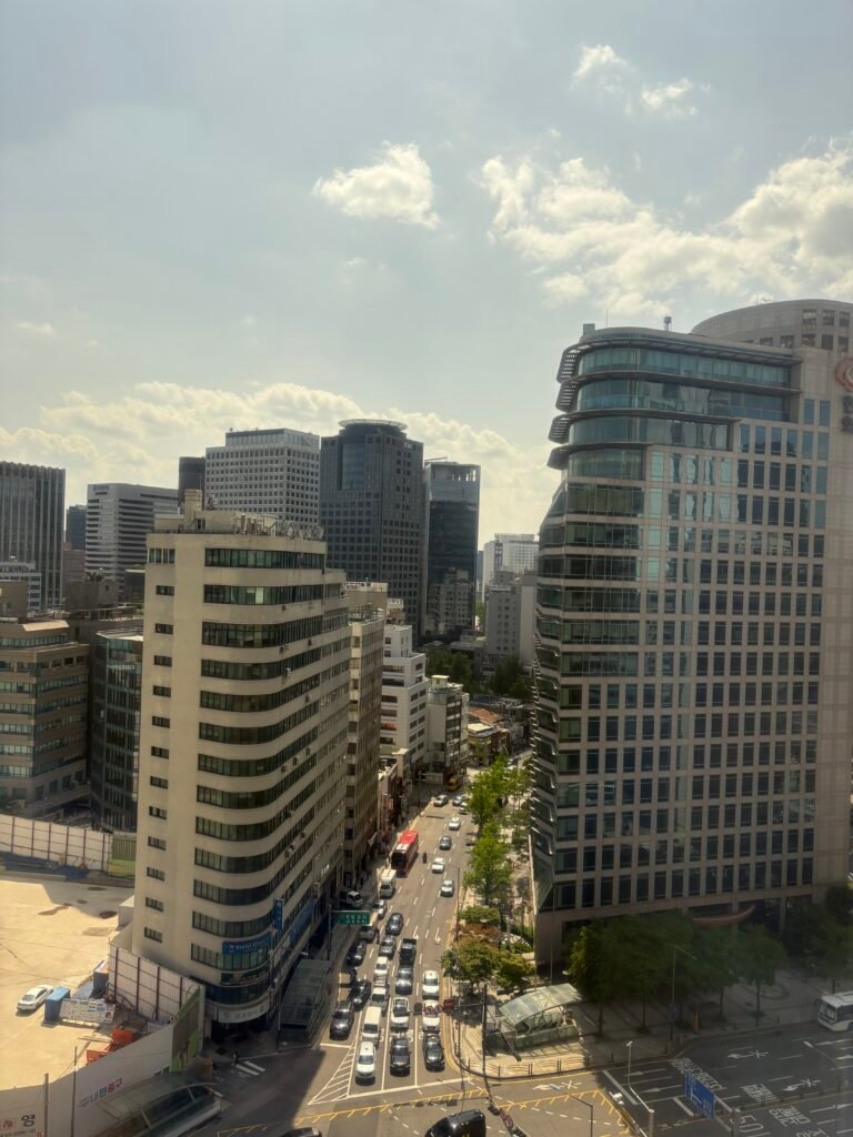 City and construction-site view from the Executive Suite window