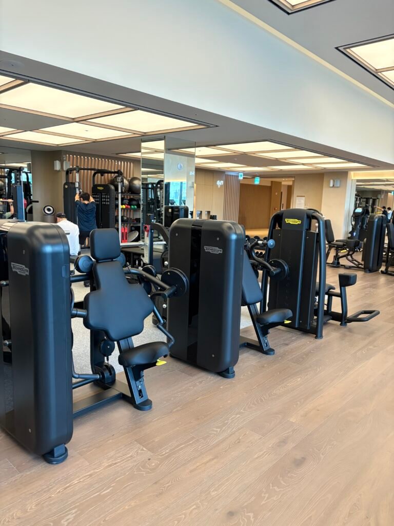 Spacious fitness centre with weight and cardio machines at The Westin Seoul Parnas