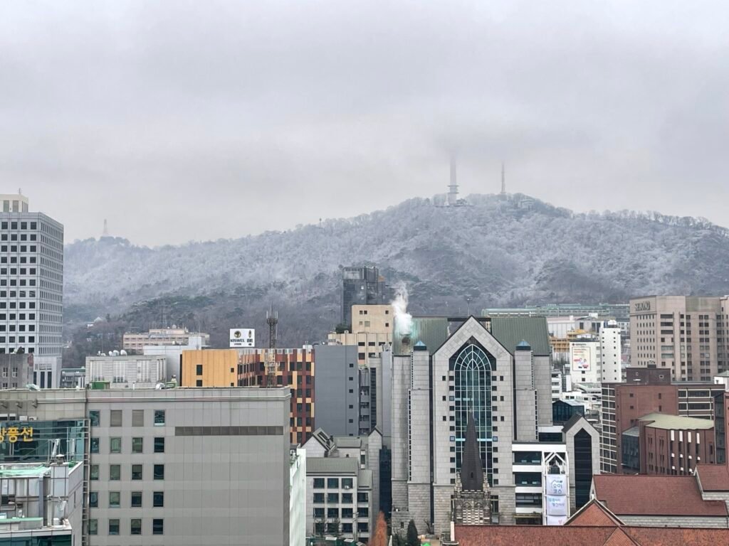 Snow-covered Namsan and N Seoul Tower viewed from Four Points Seoul Myeongdong