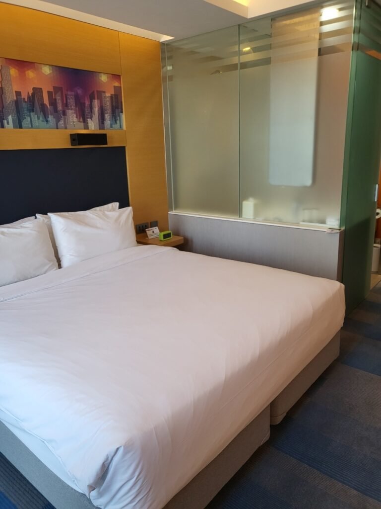 King guest room with glass-partition bathroom at Aloft Seoul Gangnam