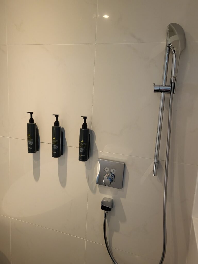Walk-in shower with Drybar bath products at Aloft Seoul Gangnam