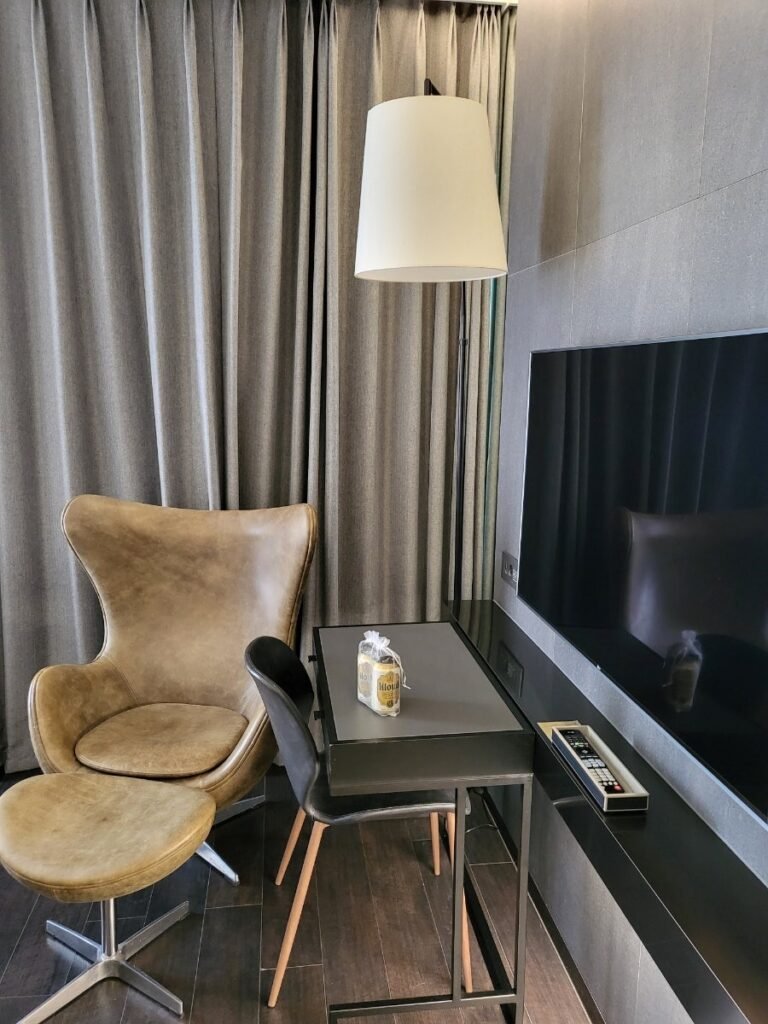 Chair, desk and television inside a Four Points Seoul Gangnam room