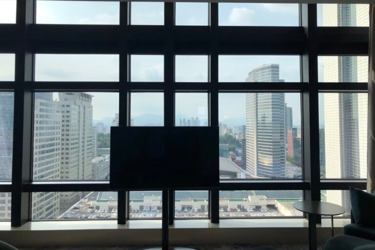 High-ceiling Club Grand Suite with floor-to-ceiling windows at Grand InterContinental Seoul Parnas