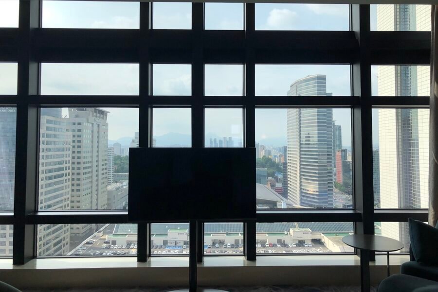 High-ceiling Club Grand Suite with floor-to-ceiling windows at Grand InterContinental Seoul Parnas