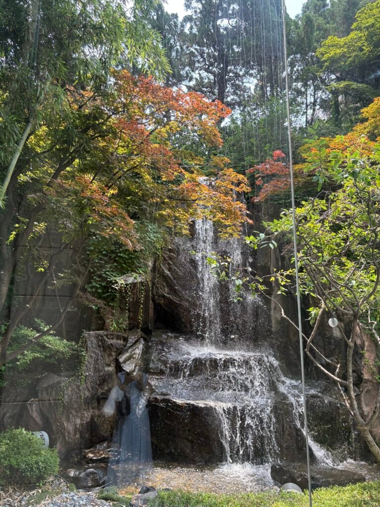 Indoor waterfall beside Peninsula Lounge at Lotte Hotel Seoul