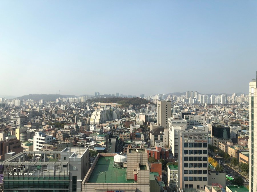 Daytime Hongdae and Mapo city view from an Editor Room at RYSE Seoul