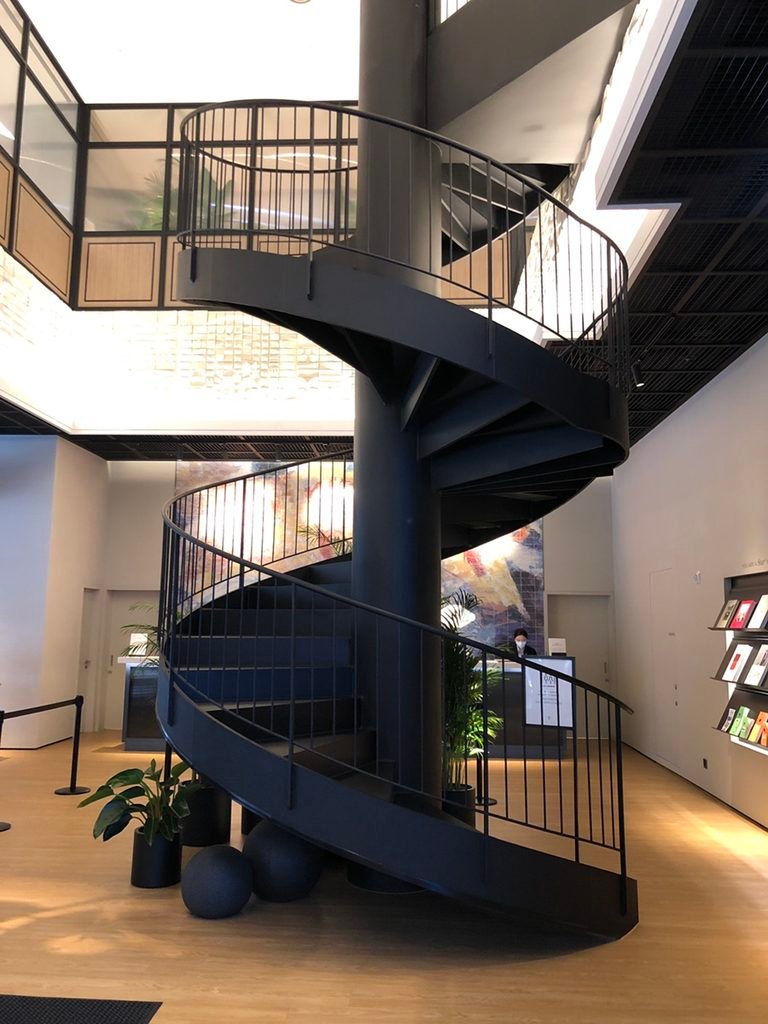 Spiral staircase in the lobby of GRAVITY Josun Seoul Pangyo