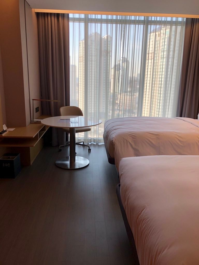 Two-bed guest room interior at Courtyard by Marriott Suwon